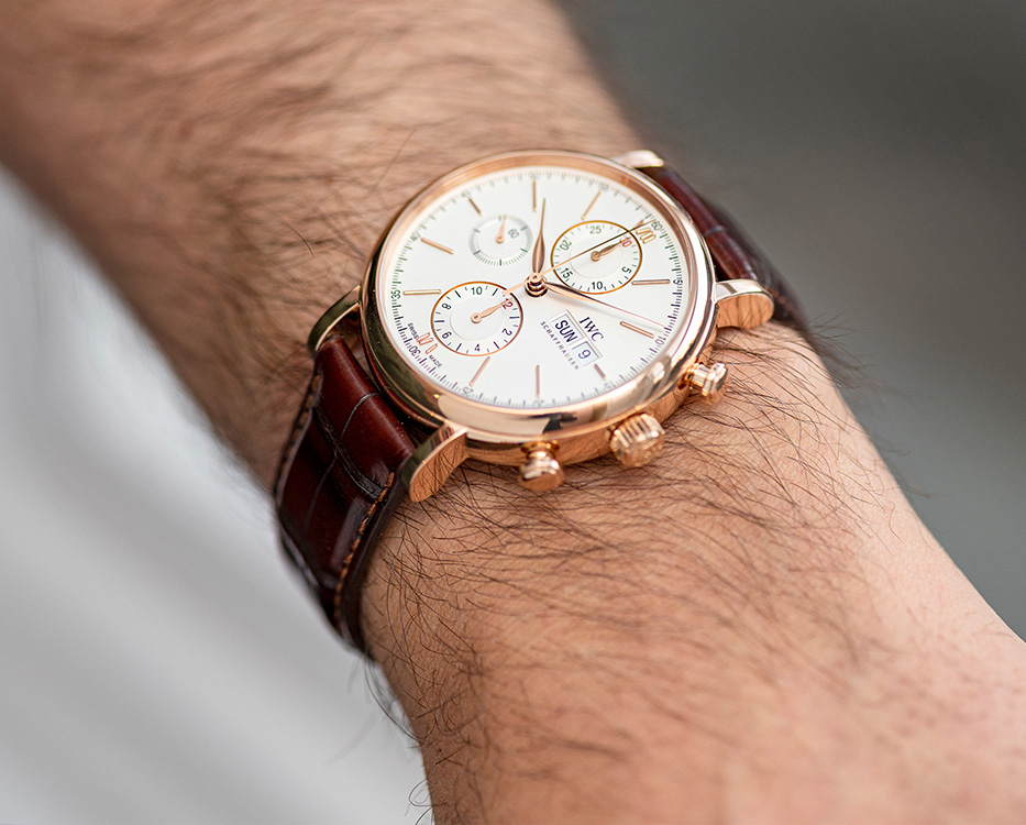 IWC Schaffhausen chronograph watch with brown leather strap on wrist