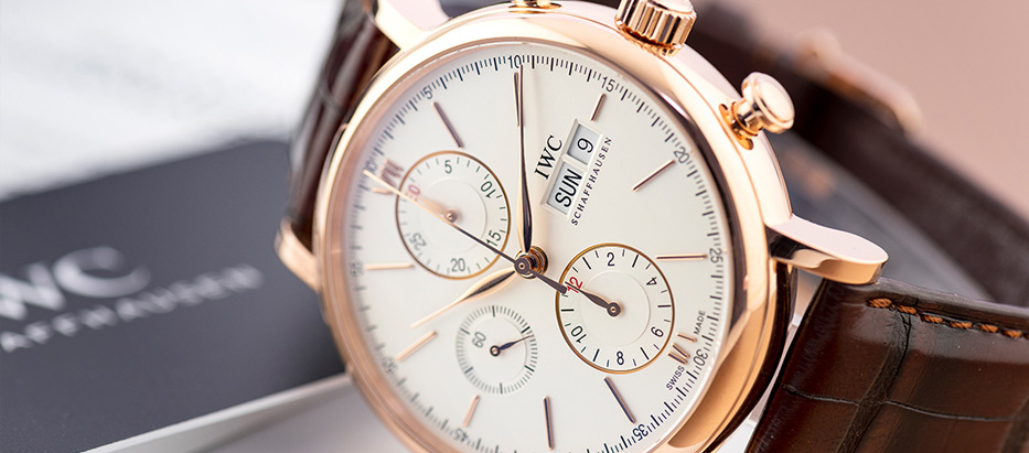 IWC Schaffhausen watch with brown leather strap watch face close up