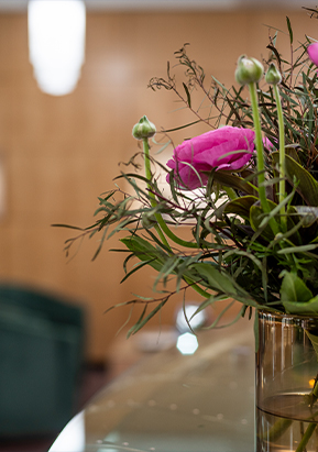 Pink flowers in vase at Prestons showroom