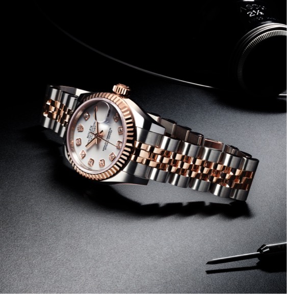 Rolex two-tone silver and rose gold link bracelet watch