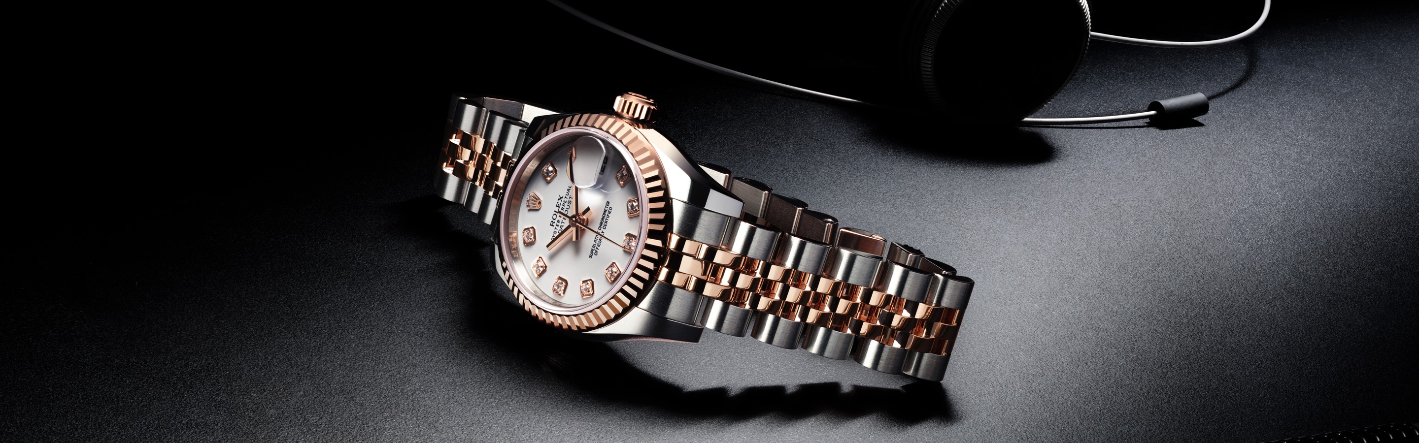 Rolex two-tone silver and rose gold link bracelet watch