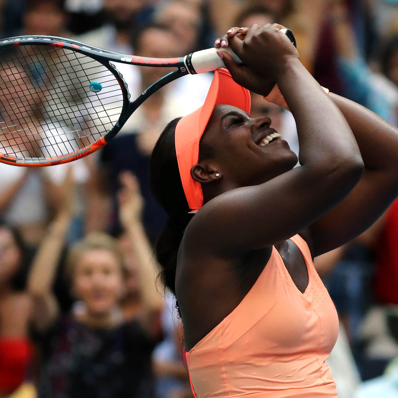 Sloane Stephens holding tennis racket