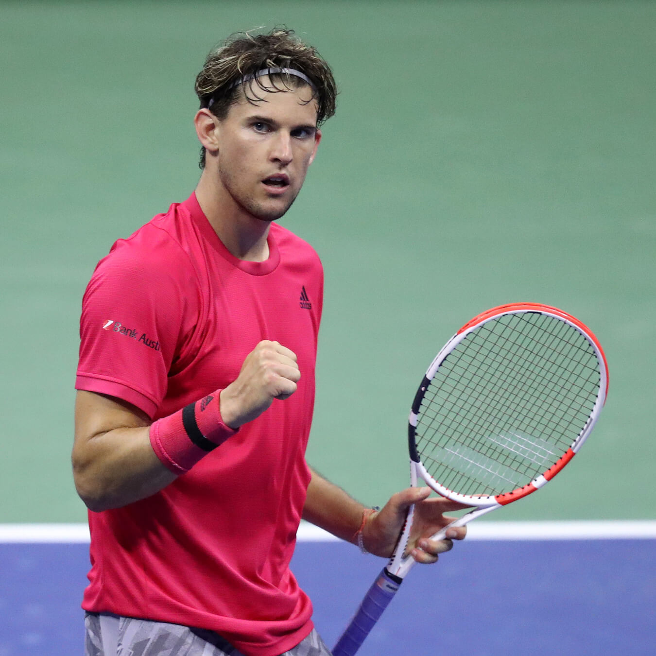 Dominic Thiem holding tennis racket