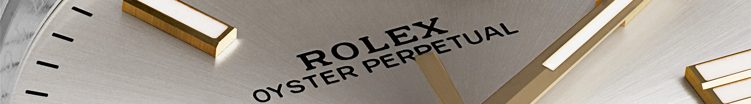 Close up of Rolex Oyster Perpetual watch dial logo