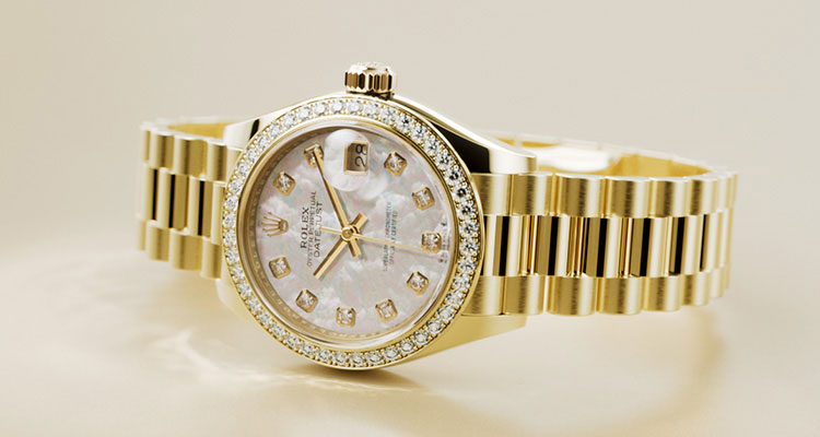 Ladies gold Rolex Datejust watch with link bracelet and diamond detail around dial