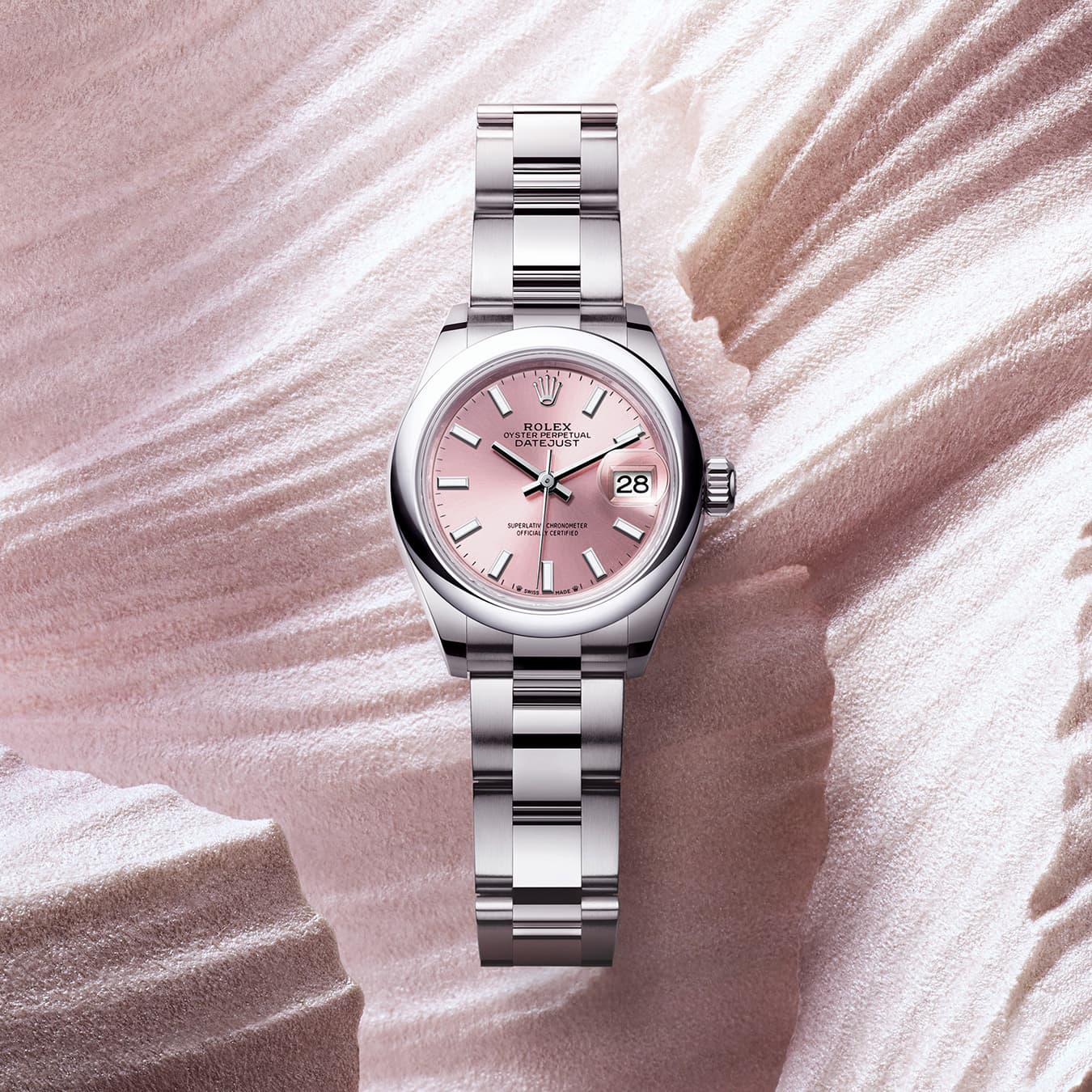 Silver Rolex Lady Datejust watch with pink dial