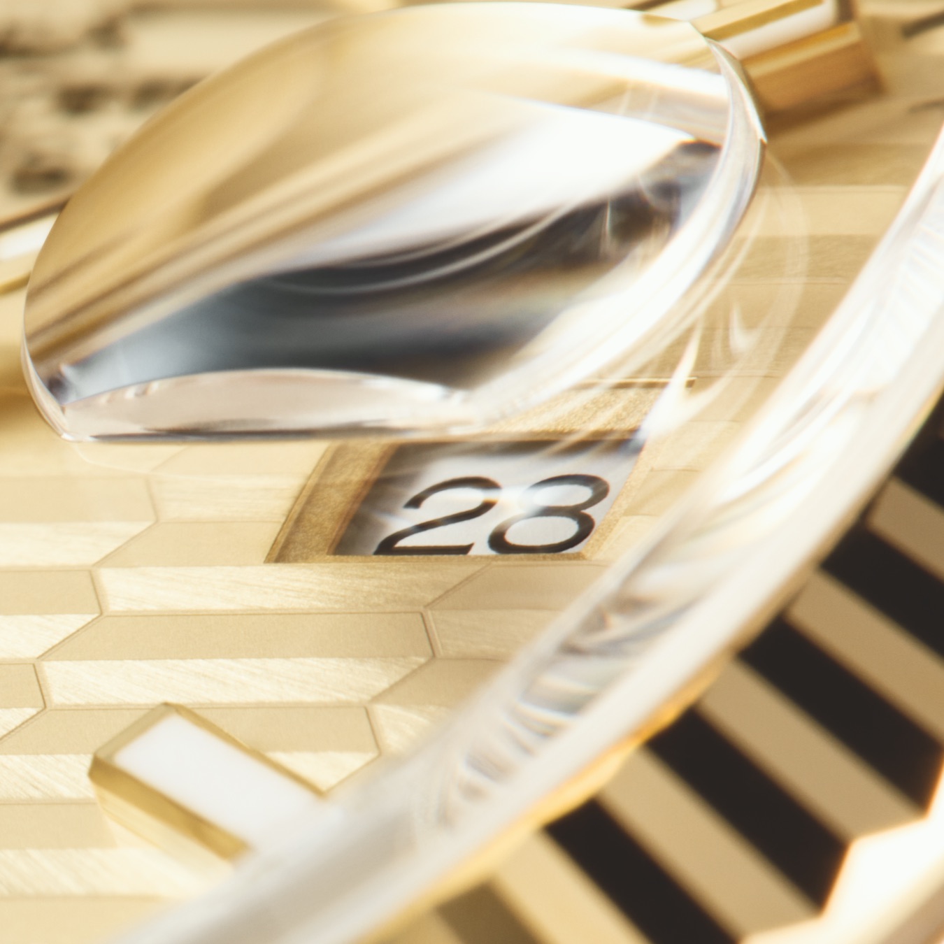 Close up of gold Rolex Datejust watch dial