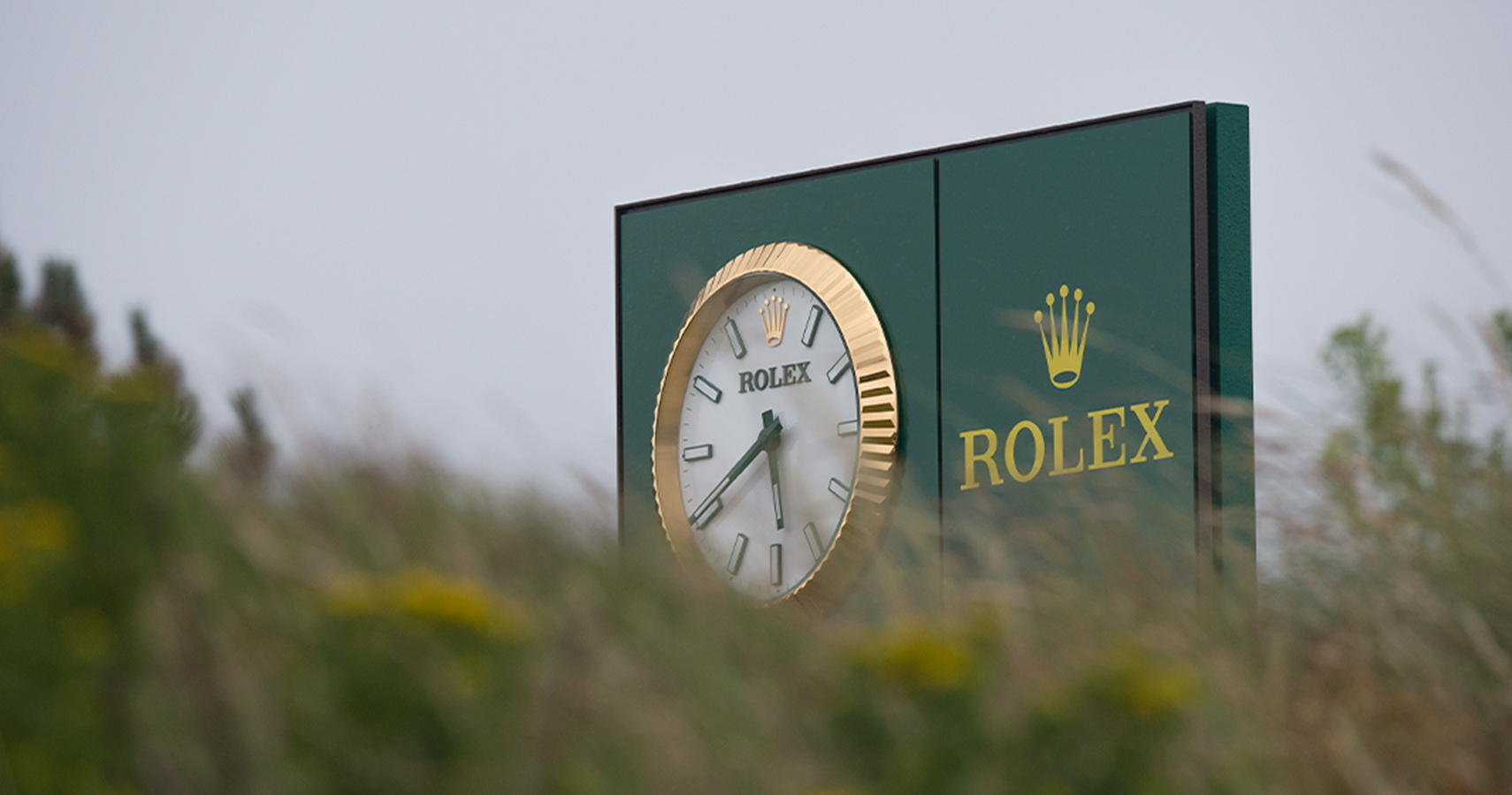 Rolex clock on golf course
