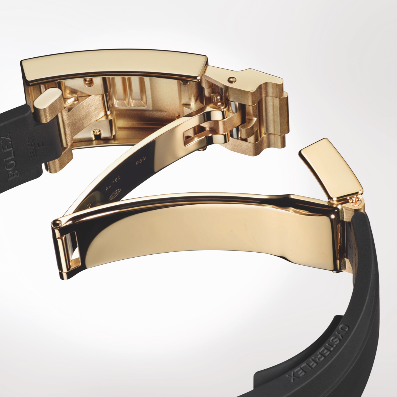 Gold Rolex watch fastening on link strap