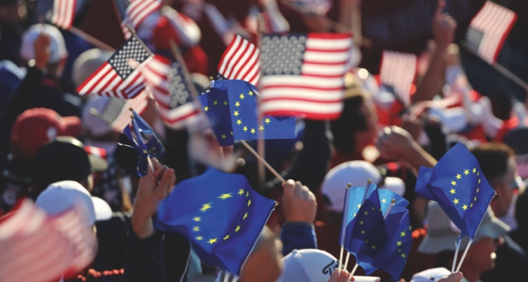 USA and EU flags being waved in crowd