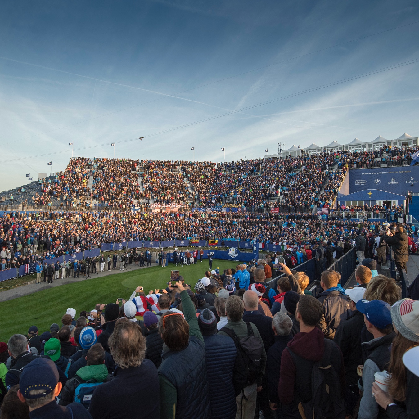 Spectators watching golf at Ryder Cup