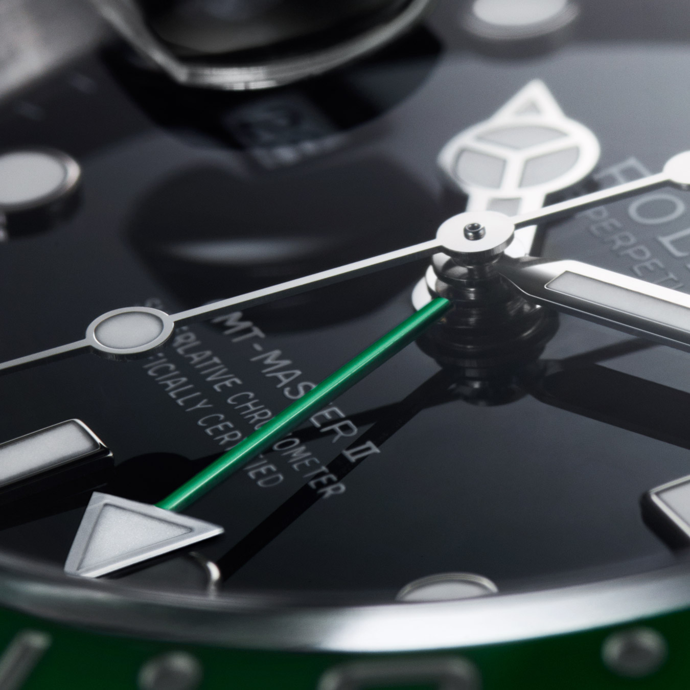 Green seconds hand of Rolex watch
