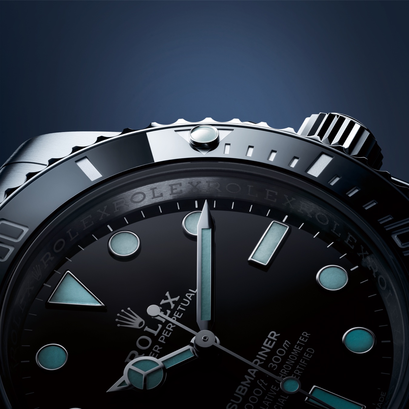 Close up on Rolex Oyster Perpetual watch with black dial and light blue details