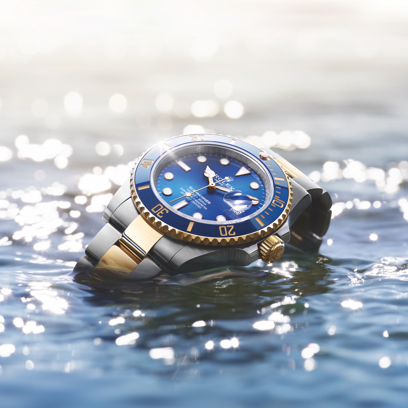 Two-tone Rolex watch with navy dial in water