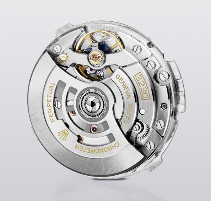 Inside workings of silver Rolex watch