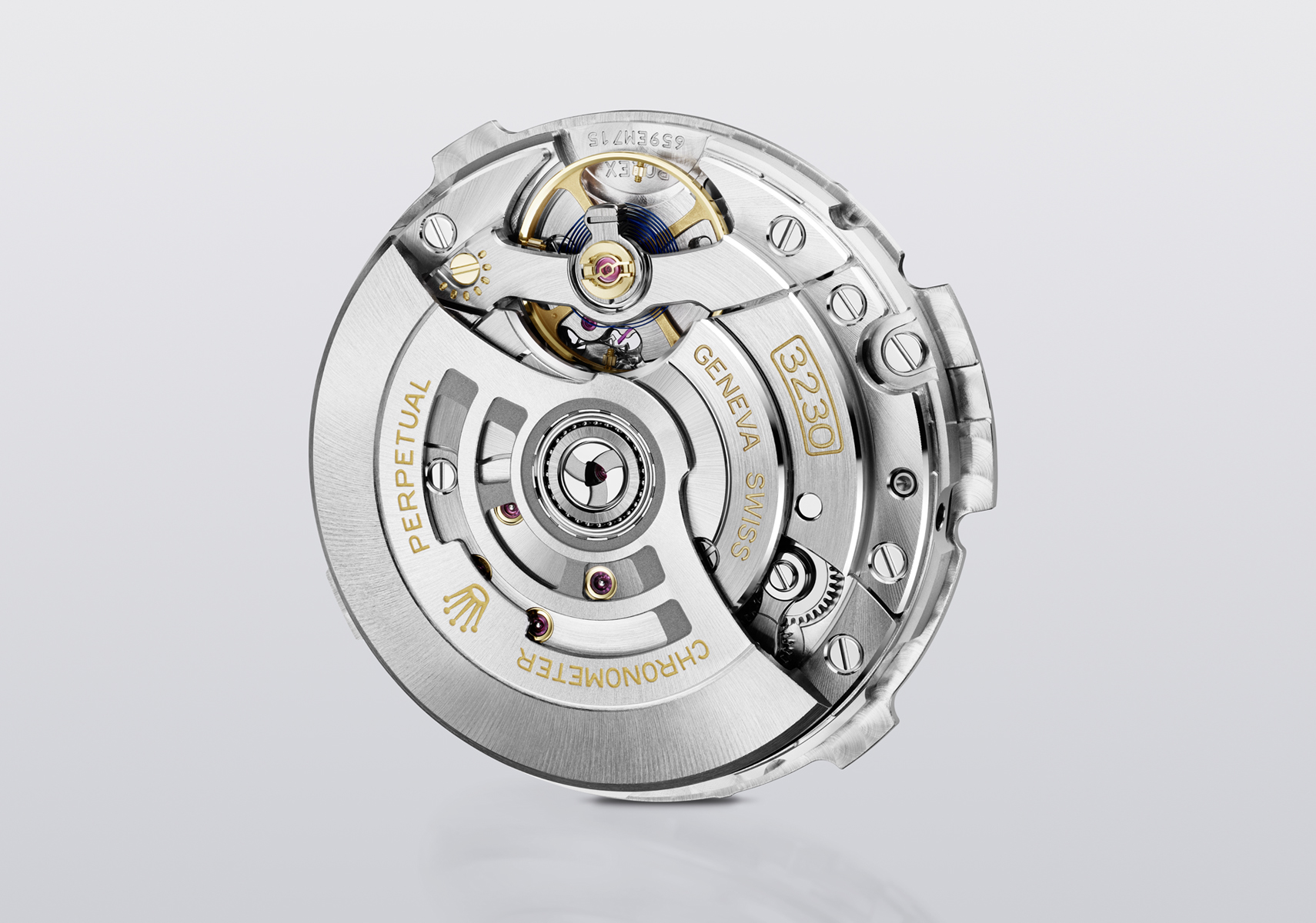 Inside workings of silver Rolex watch on grey background