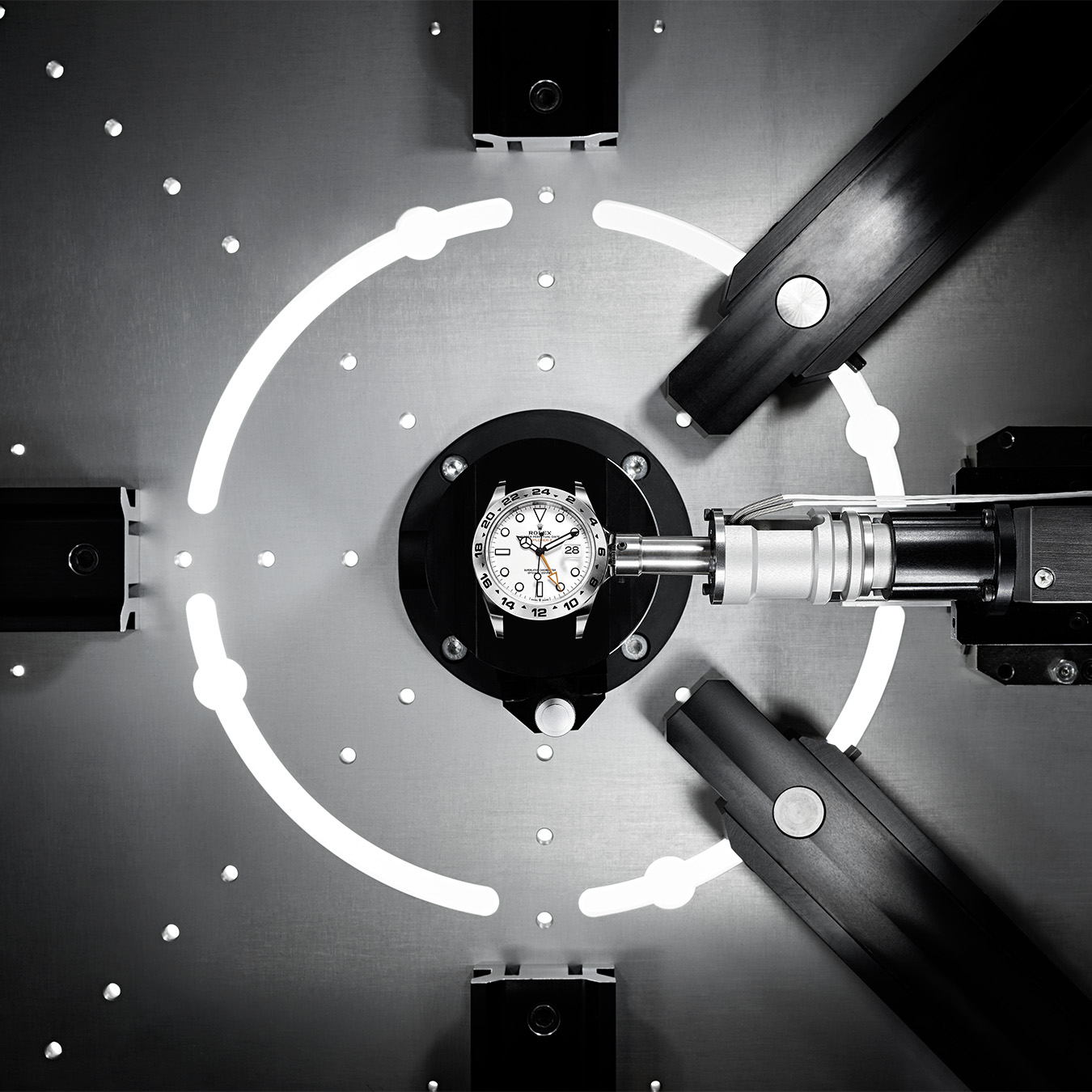 Rolex watch being worked on, white dial and black strap