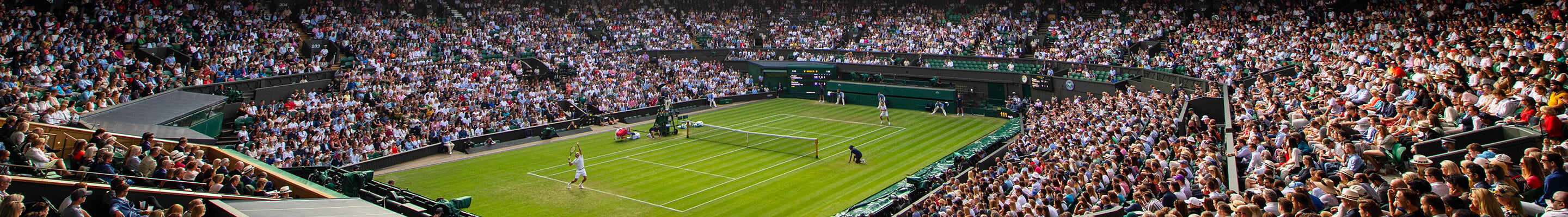 Tennis player serving at Wimbledon tournament banner