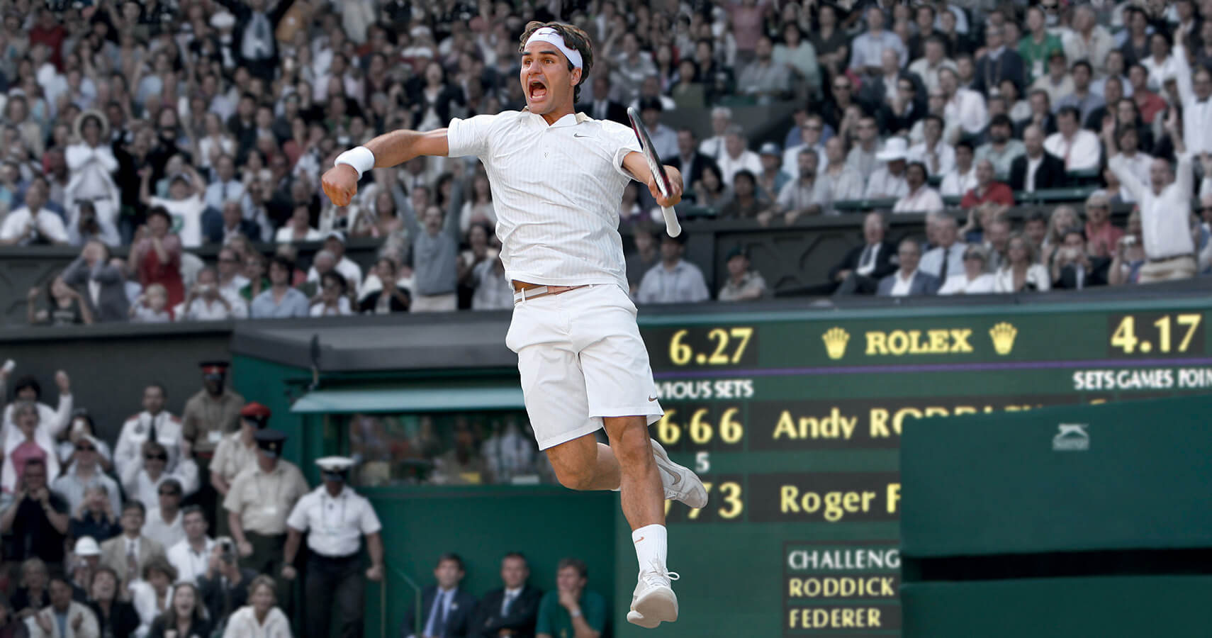 Roger Federer at Wimbledon, Rolex logo in background banner