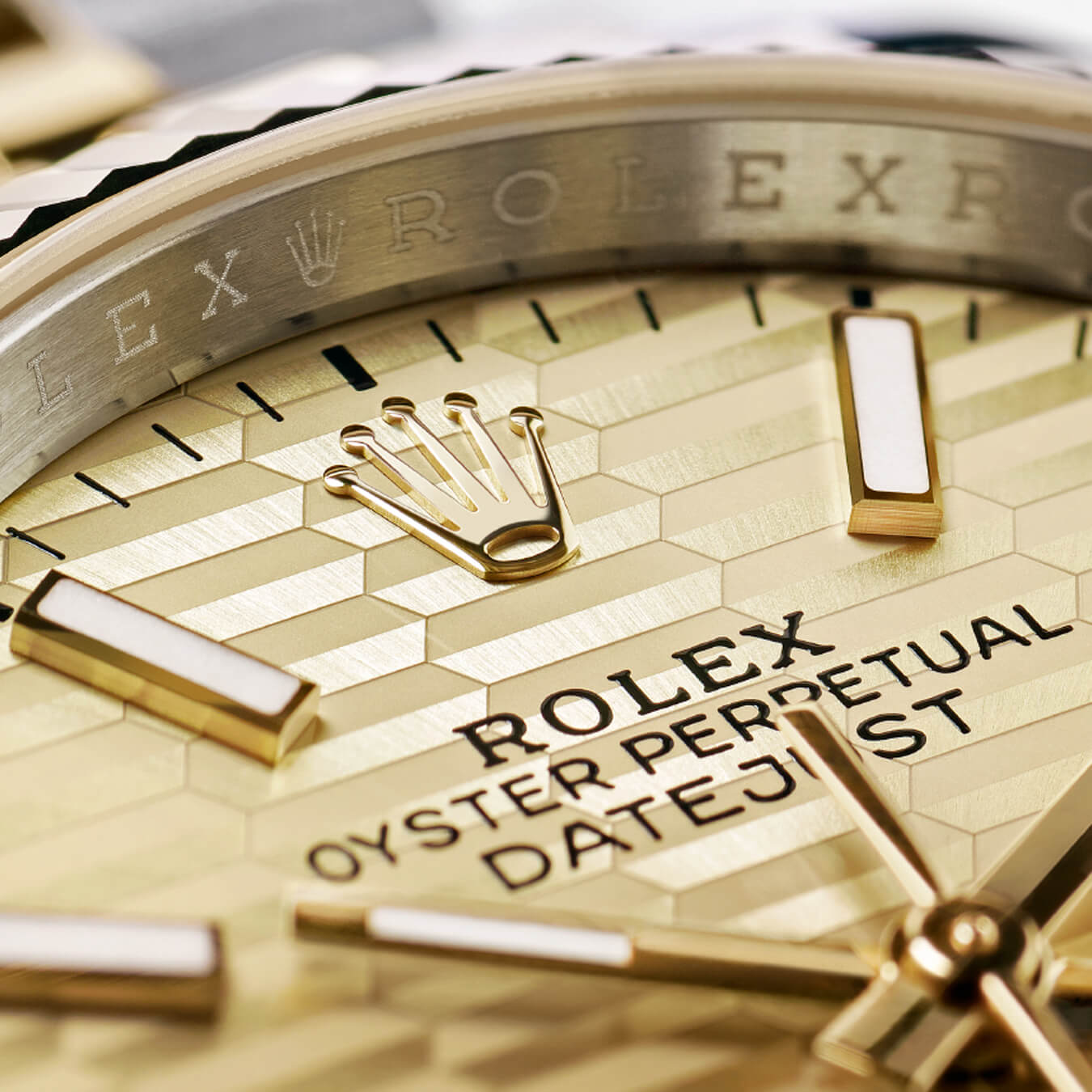 Close up on Rolex Oyster Perpetual gold watch dial
