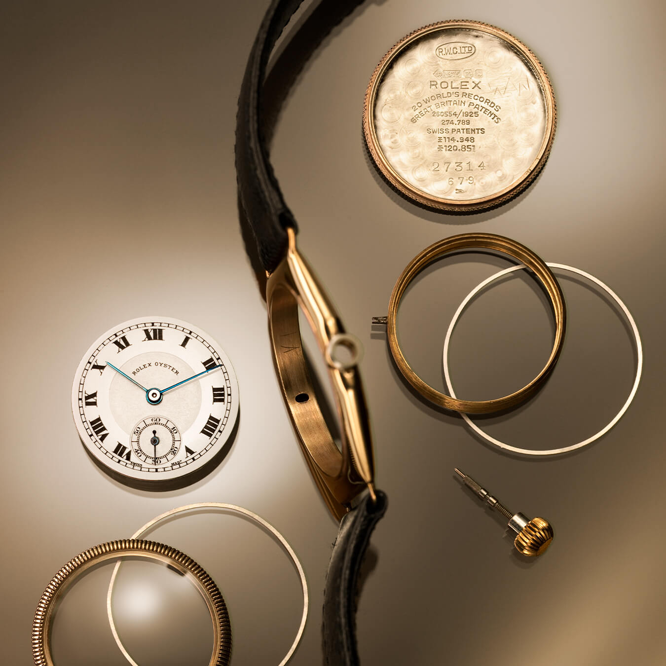 Deconstructed gold Rolex watch