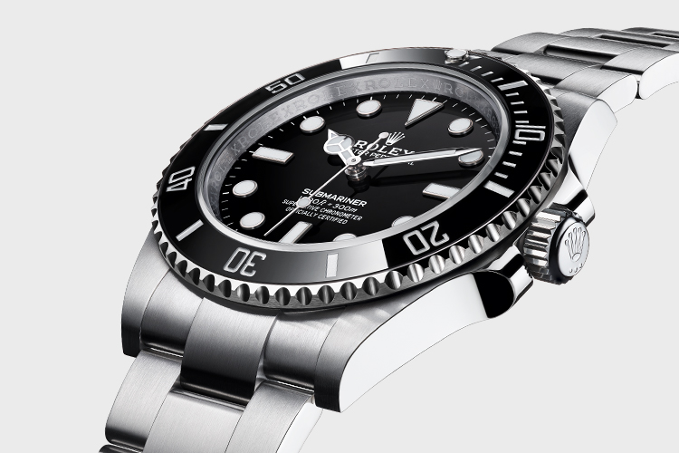 Close up of Rolex Submariner black watch dial