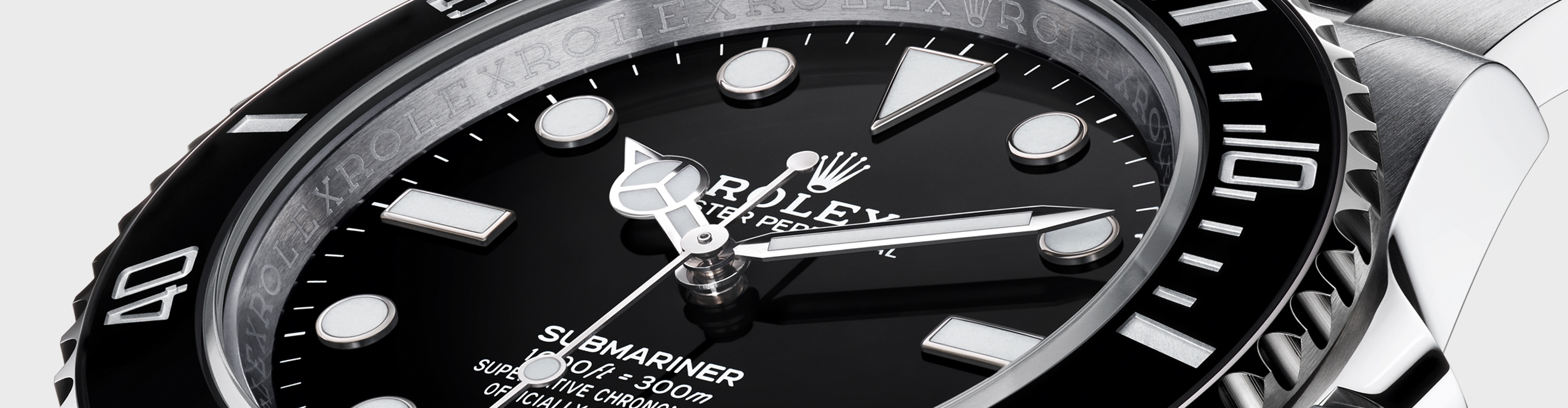Close up of Rolex Submariner black watch dial