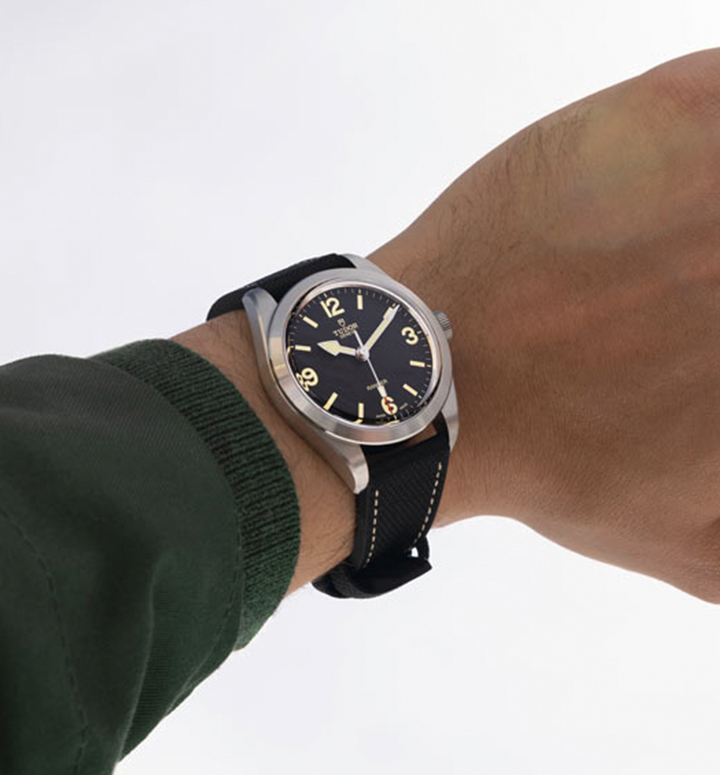 Tudor Ranger collection watch with rubber and leather bracelet and a black domed dial