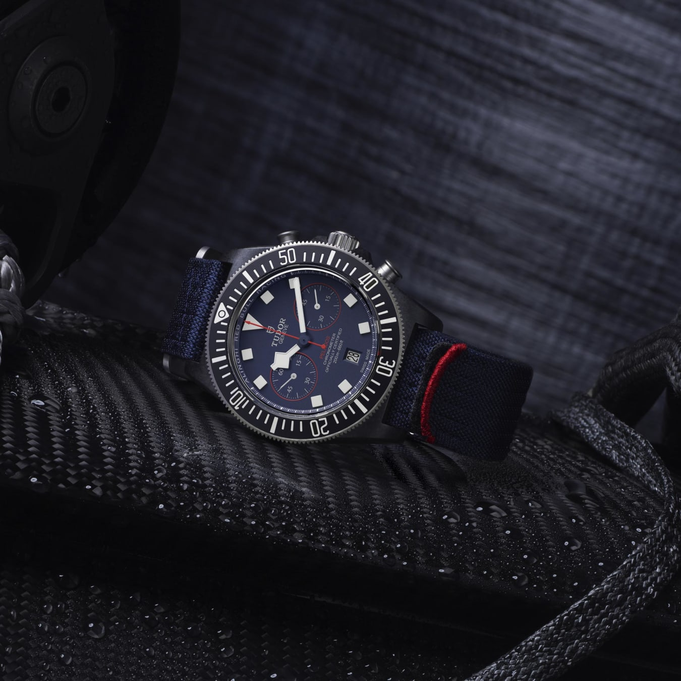 TUDOR Pelagos FXD Chrono 43mm black carbon composite case with matte finish and Alinghi Red Bull Racing logo engraved on the case back - M25807KN-0001 at Prestons